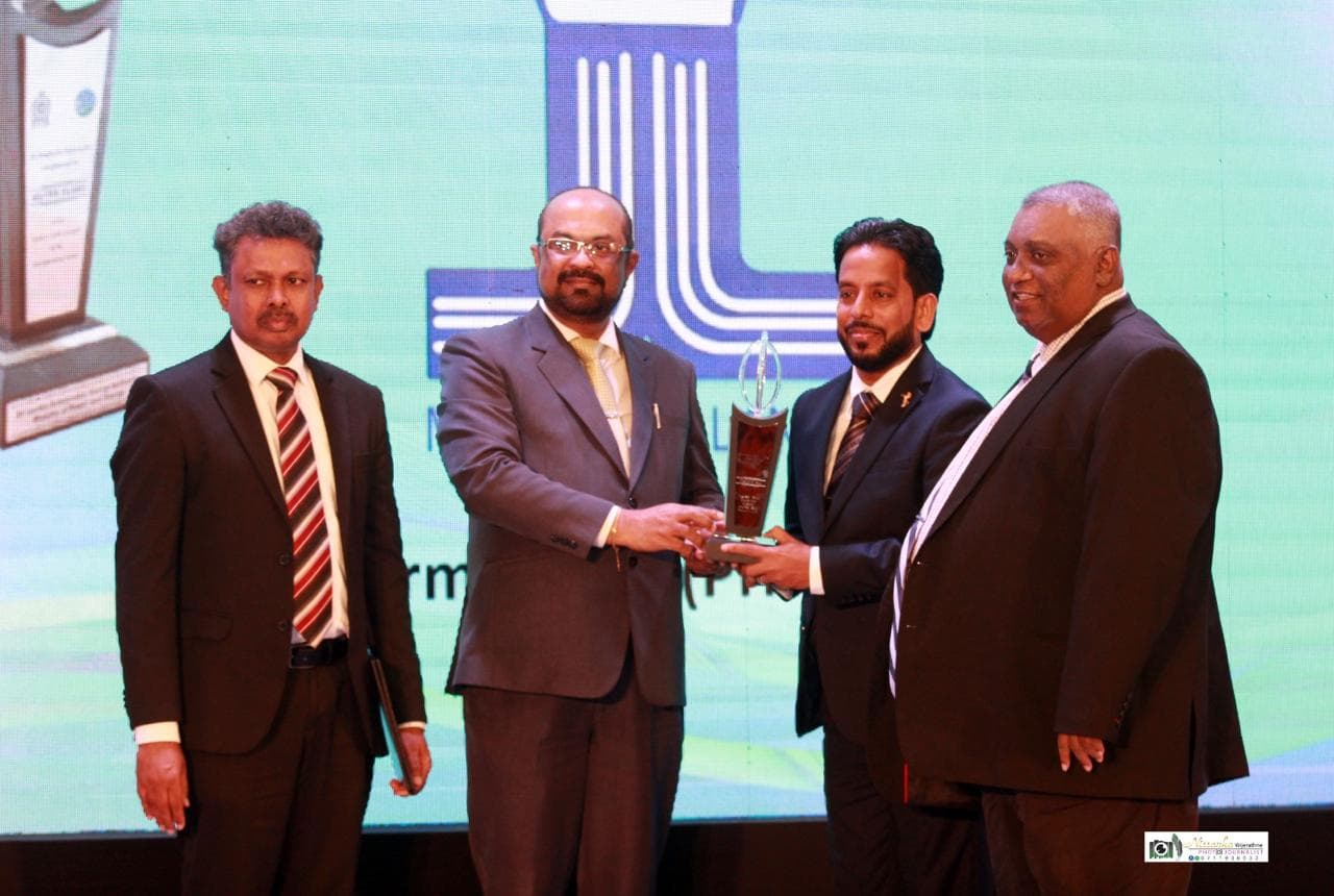 Maxtherm Lanka receiving recognition on the awards stage