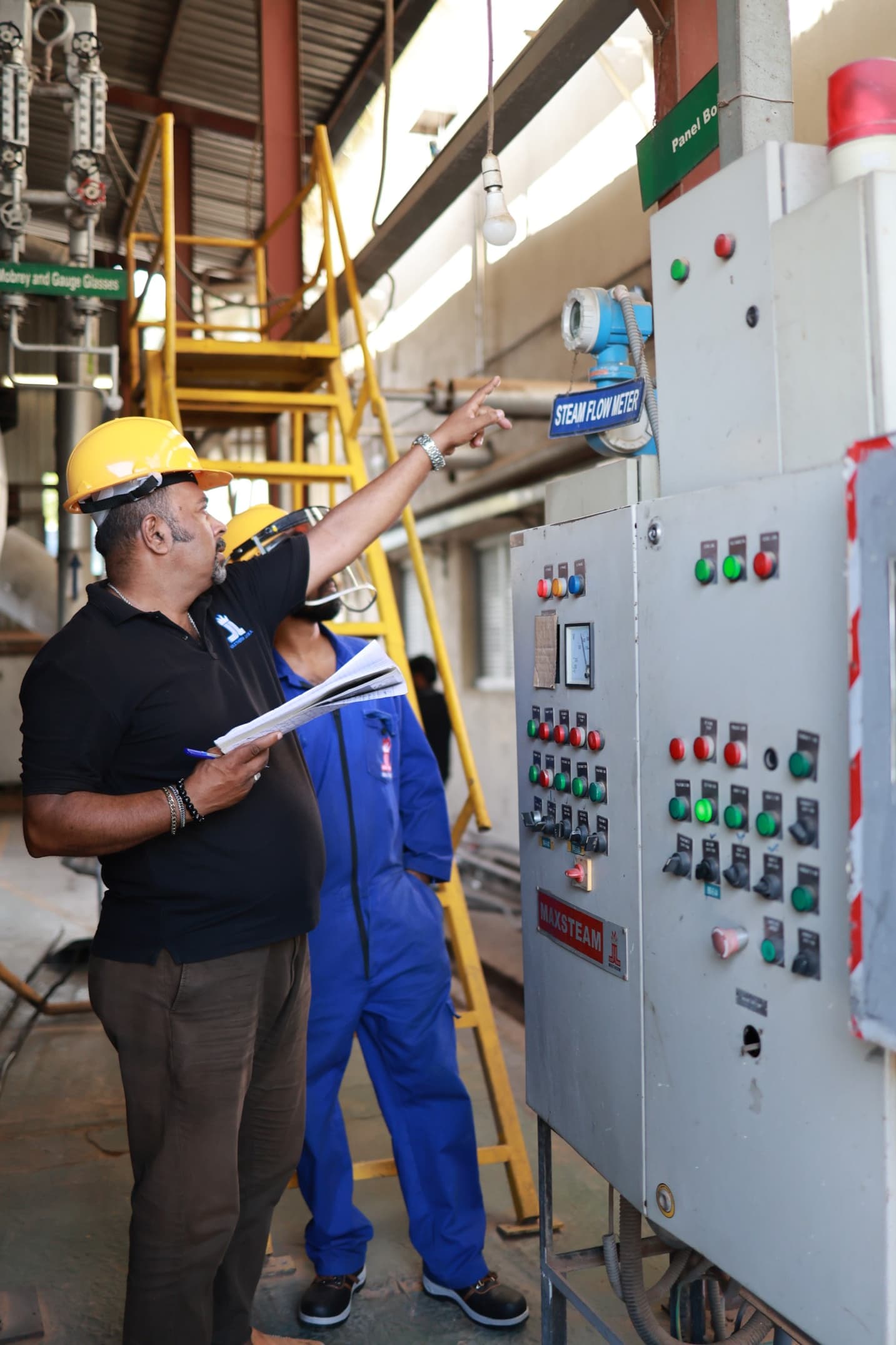 Technician inspecting solar panels